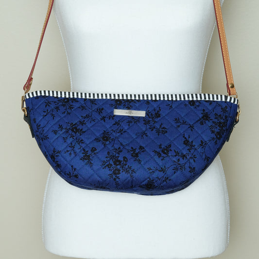 Quilted Halfmoon Crossbody Bag (Deep Blue, Black Flower)